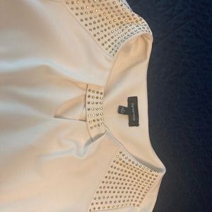 Very well made cream with shoulder and neck studded dress